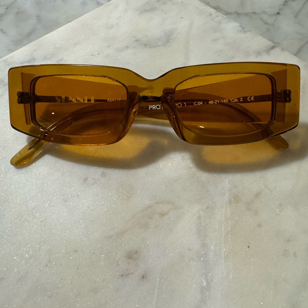 Sunnei Prototipo 1 Sunglasses in amber. Acetate